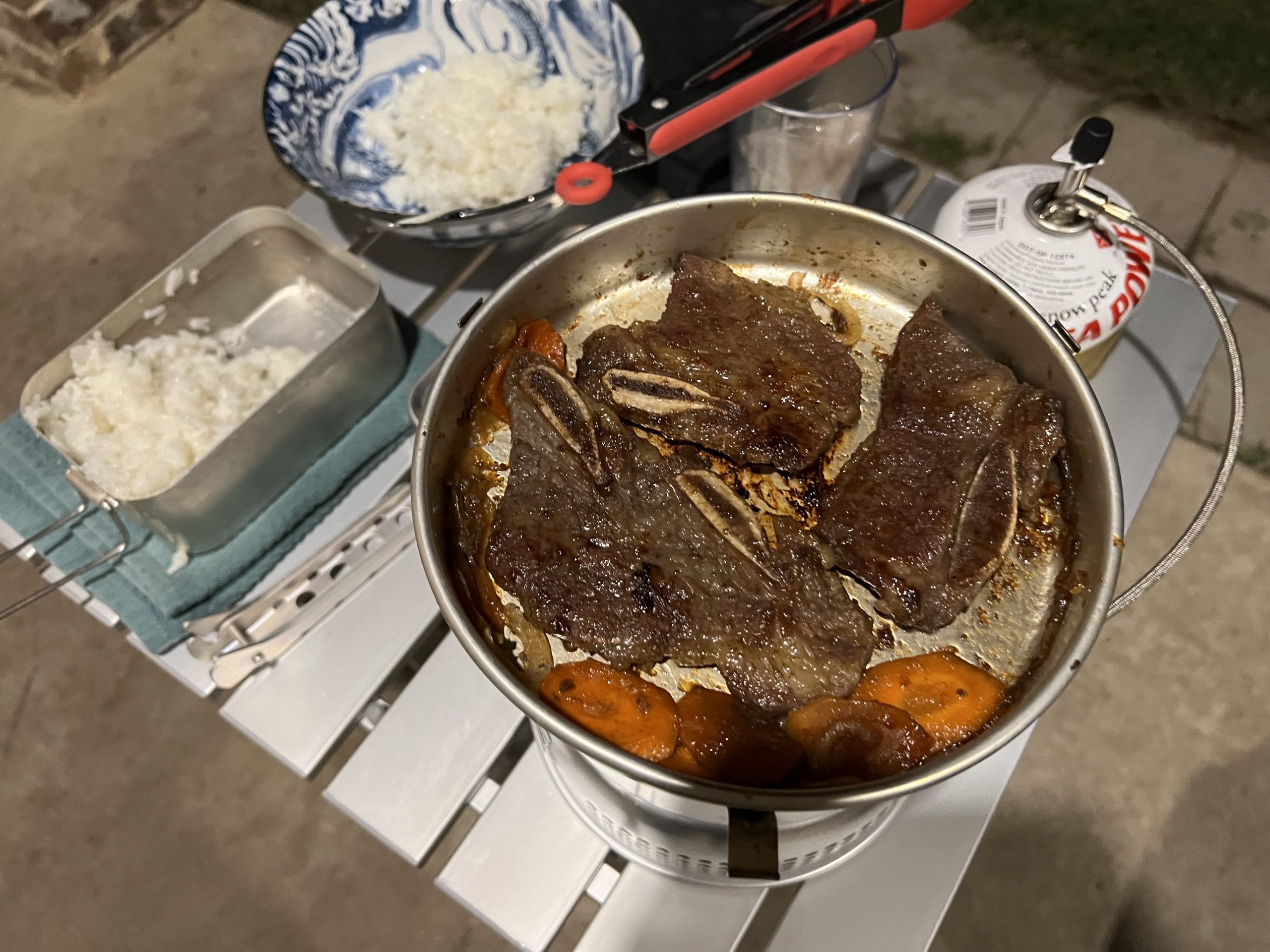 Cooking Short Ribs and Rice Outside